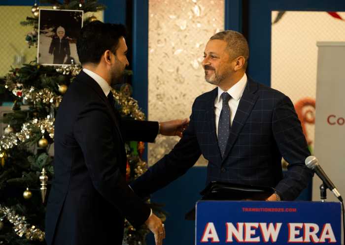 Mayor-elect Zohran Mamdani shakes hand of new budget director