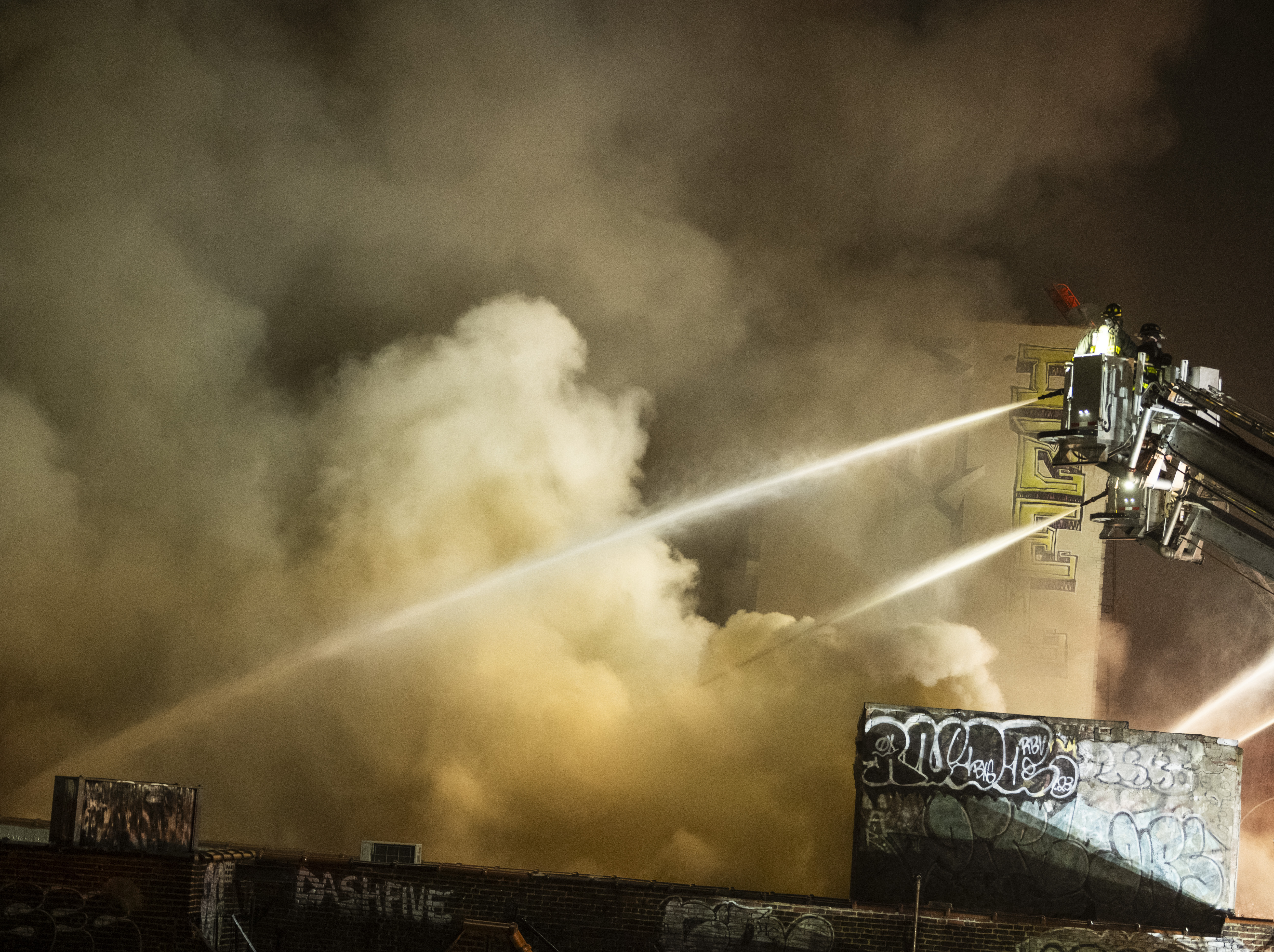 Firefighters were forced into a defensive operation as heavy fire consumed multiple buildings on Prospect Avenue on Thursday into Friday morning.