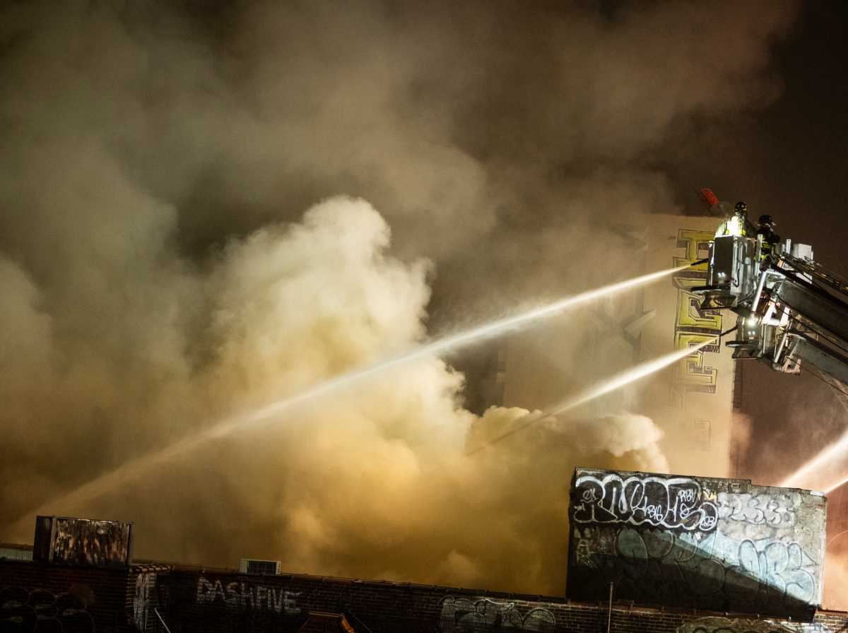 Firefighters were forced into a defensive operation as heavy fire consumed multiple buildings on Prospect Avenue on Thursday into Friday morning.