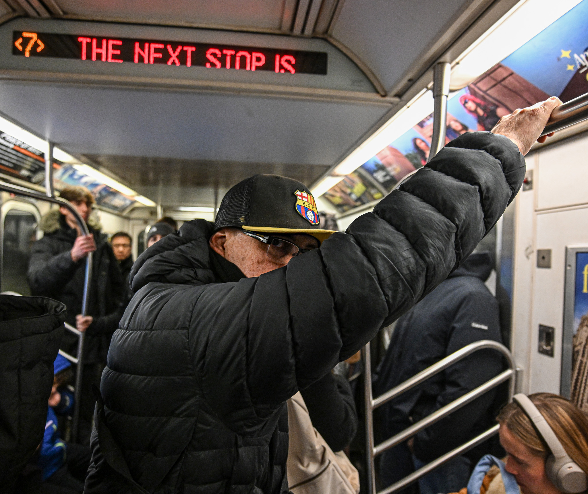 Member of NYPD Pickpocket Unit riding the subways