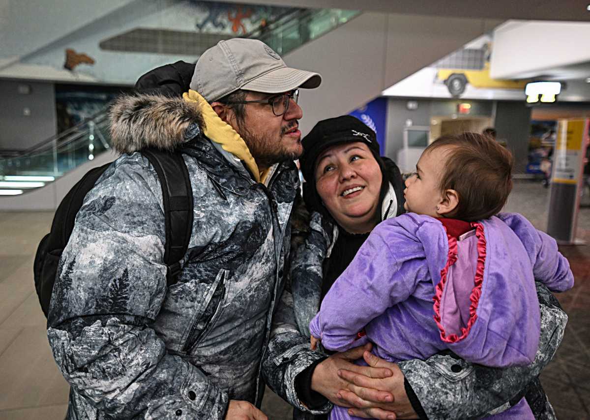 Queens man held by ICE for months reunites with family at airport