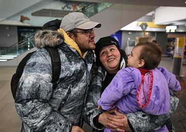 Queens man held by ICE for months reunites with family at airport