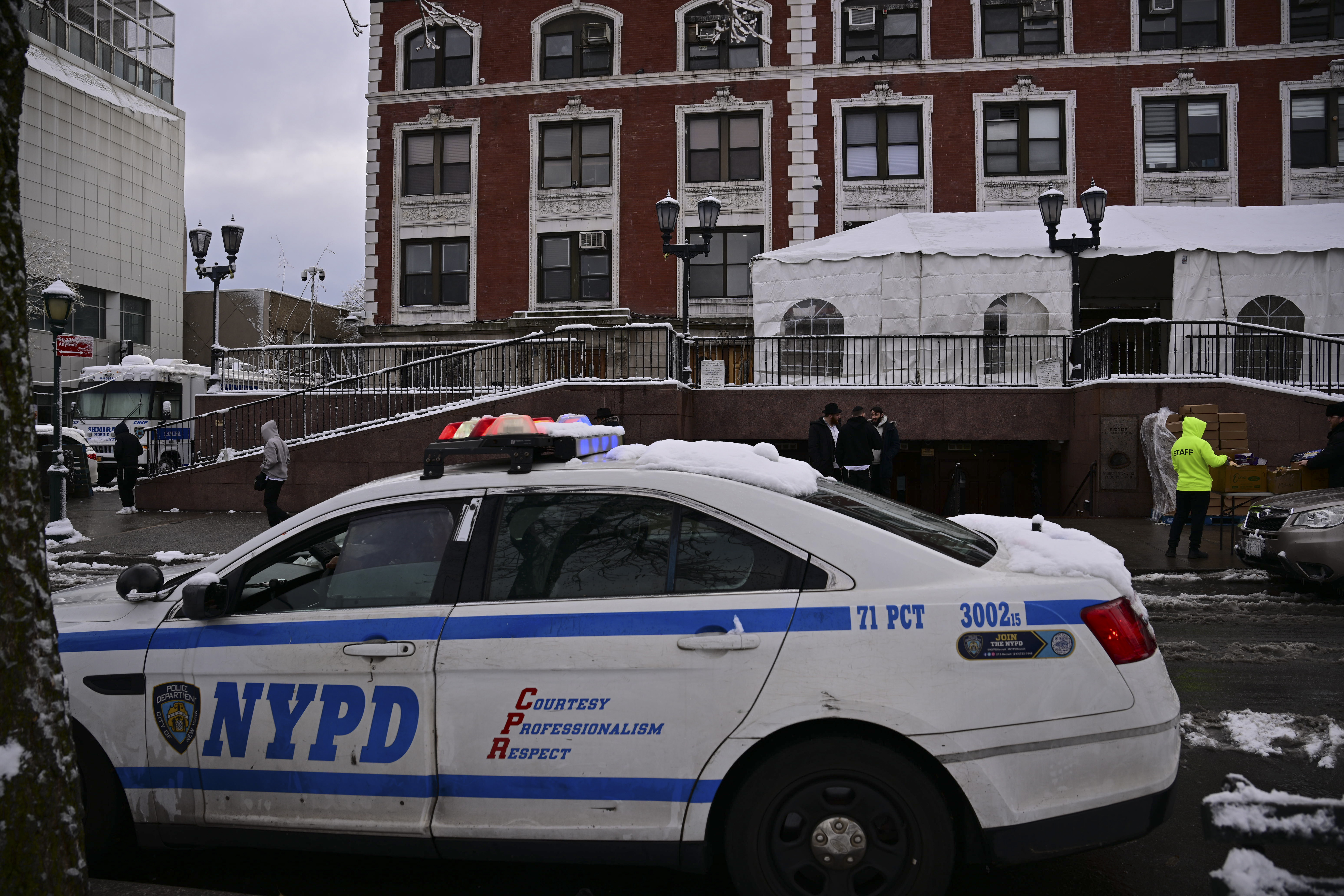 Police outside the Chabad Lubavitch world headquarters on Eastern Parkway in Crown Heights, Brooklyn on Dec. 14, 2025.