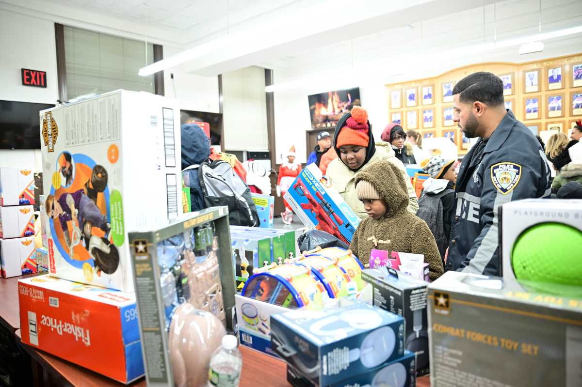 NYPD goes on a Sleigh Ride' bringing thousands of gifts across the five boroughs to children in need ahead of Christmas  amNewYork