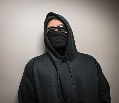 Masked ICE agent at Federal Plaza amid immigration crackdown