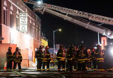 Firefighters outside Brooklyn matzoh factory after five-alarm fire