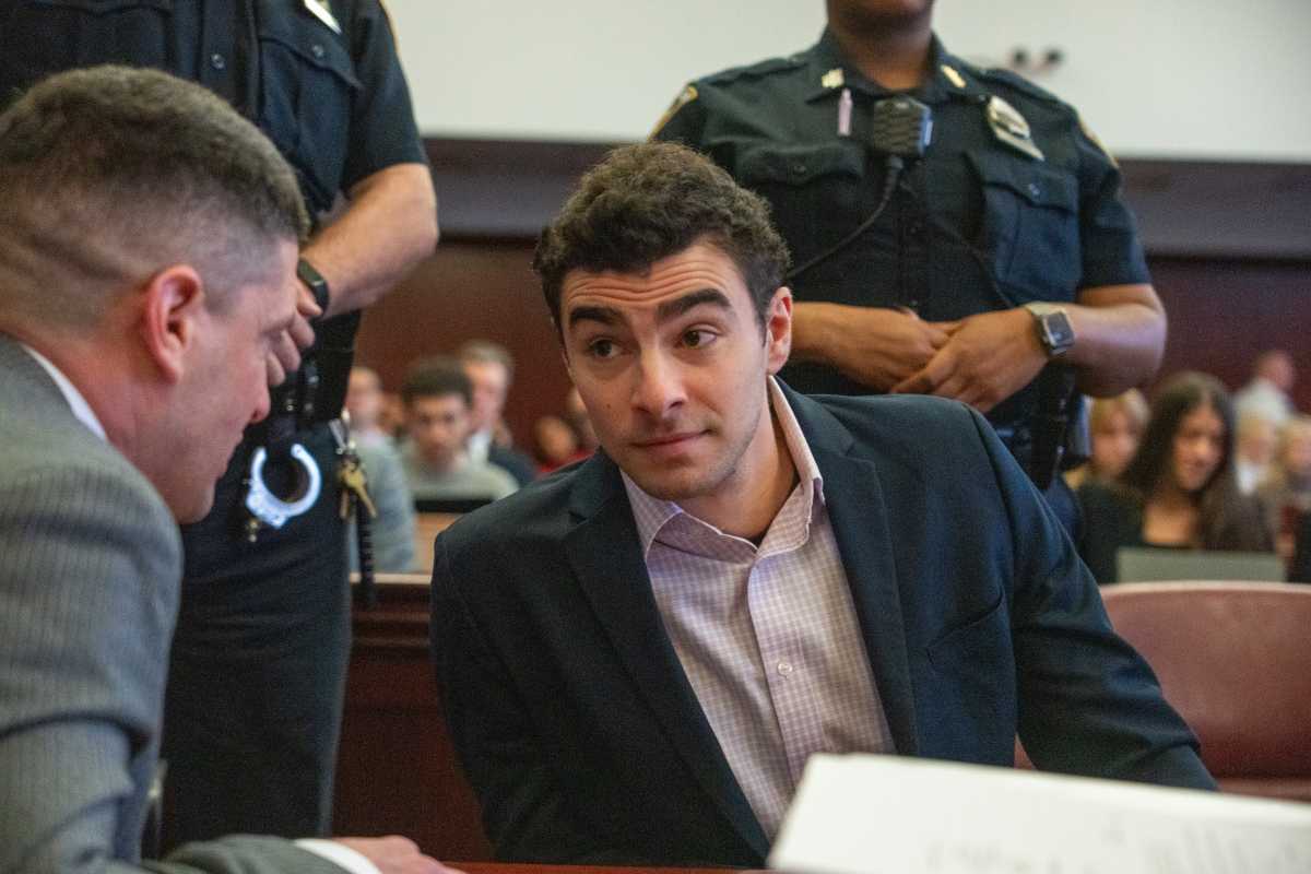 Police officer recounts arrest of Luigi Mangione in the midst of manhunt | amNewYork