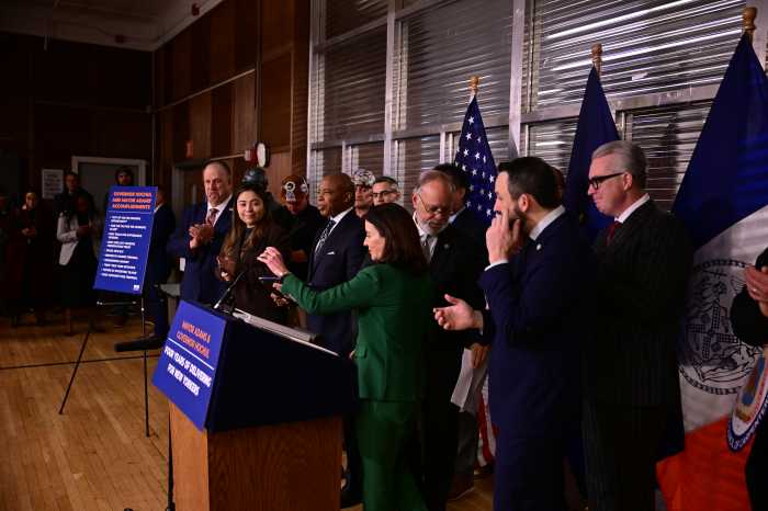 group of people indoors at a podium