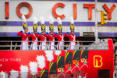 The Rockettes dressed as toy soldiers outside a music hall
