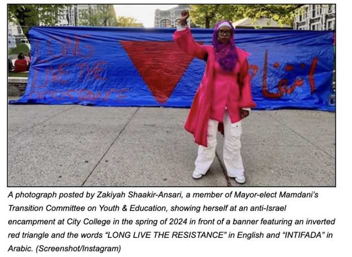 screenshot of a person wearing a long red shirt and light-colored pants