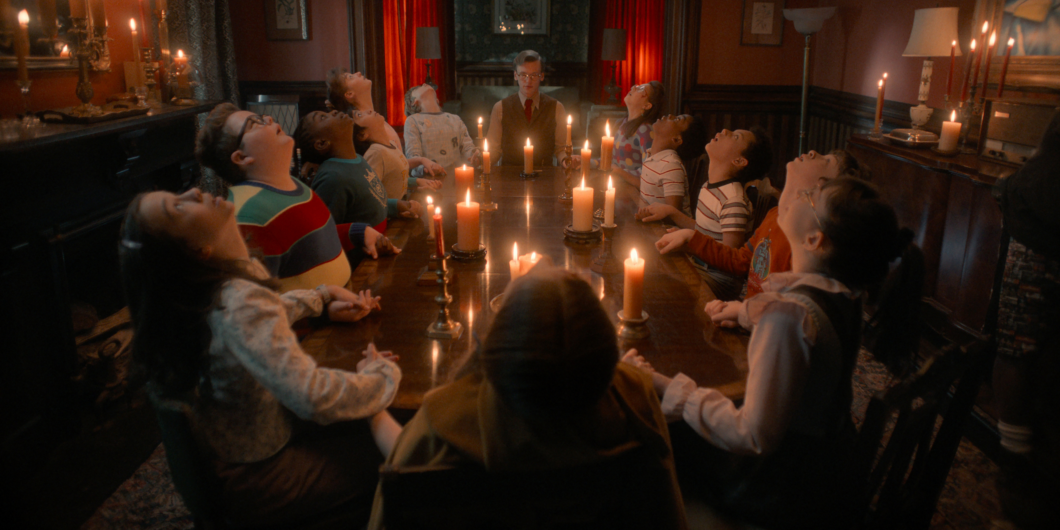(L to R) Nell Fisher as Holly Wheeler, Eden Stephens as Debbie Miller, Jake Connelly as Derek Turnbow, Alyse Elna Lewis as Wendy, Gianlucca Gazzo as Glenn, Liam Montgomery as Roger, Jamie Campbell Bower as Henry Creel, Calista Craig as Mary, Anthony B. Jenkins as Joshua, Kingston James as Benji, Olive Abercrombie as Valerie, and Birdie Borria as Rebecca in Stranger Things: Season 5. 