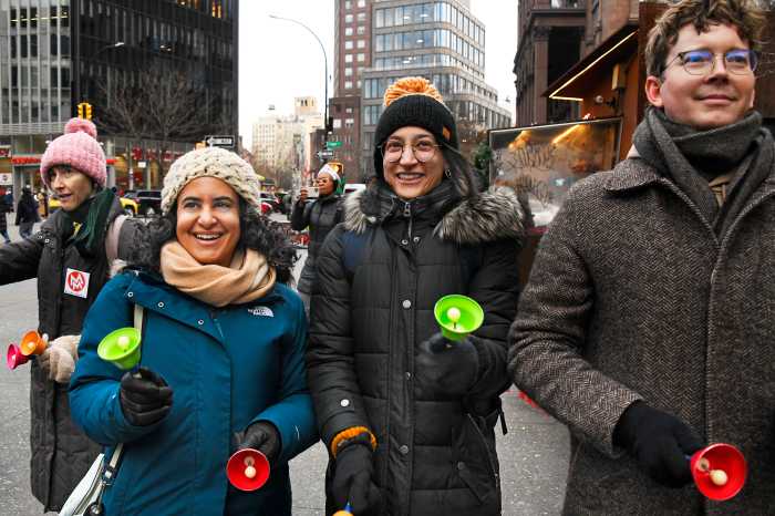 Ringing in the season: 'Bell by Bell' in East Village lets everyone jingle all the way 1 People ringing bells at Bell by Bell music event in East Village