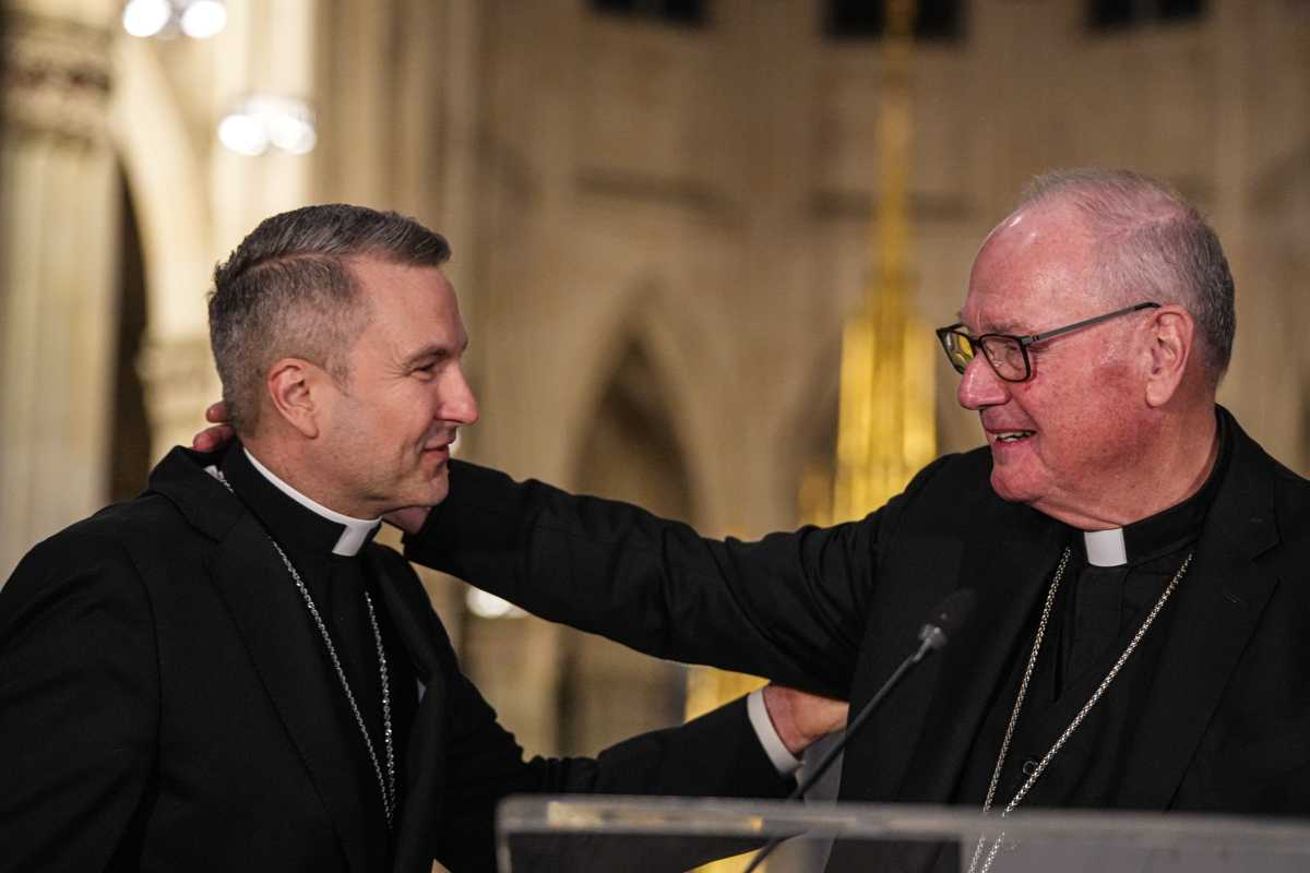 Cardinal Dolan greets Bishop Ronald Hicks at St. Patrick's Cathedral.