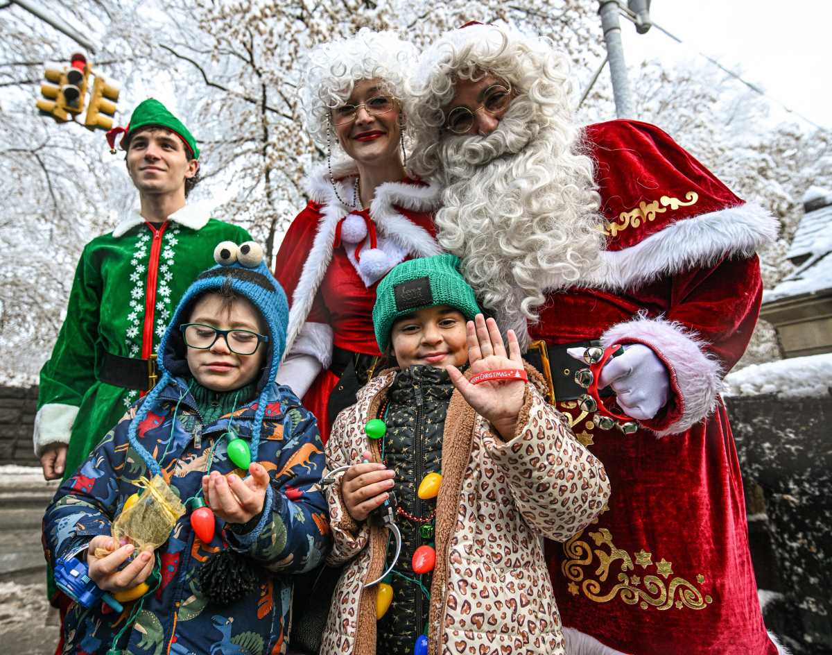 Santa with the NYPD and Candlelighters at holiday event in Central Park for families impacted by childhood cancer