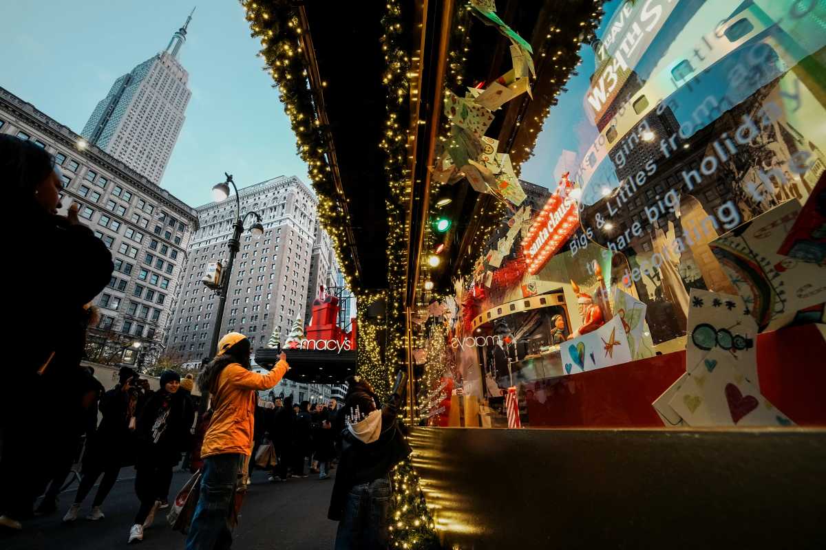 Macy's Herald Square stabbing: Suspect who violently attacked woman in bathroom had been released from mental health hospital hours earlier 3 macy's herald square store exterior people taking photos of window displays