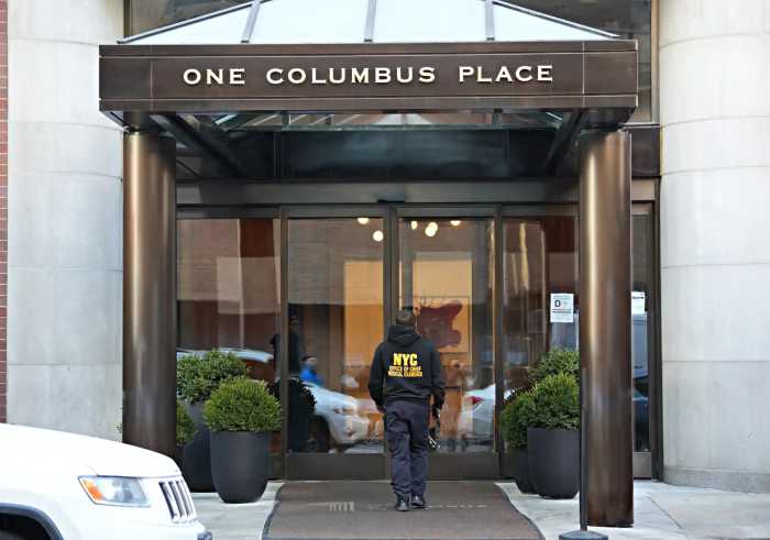 Medical examiner enters Michelle Tractenberg's apartment building. this was the most-read web story on amNY this year.