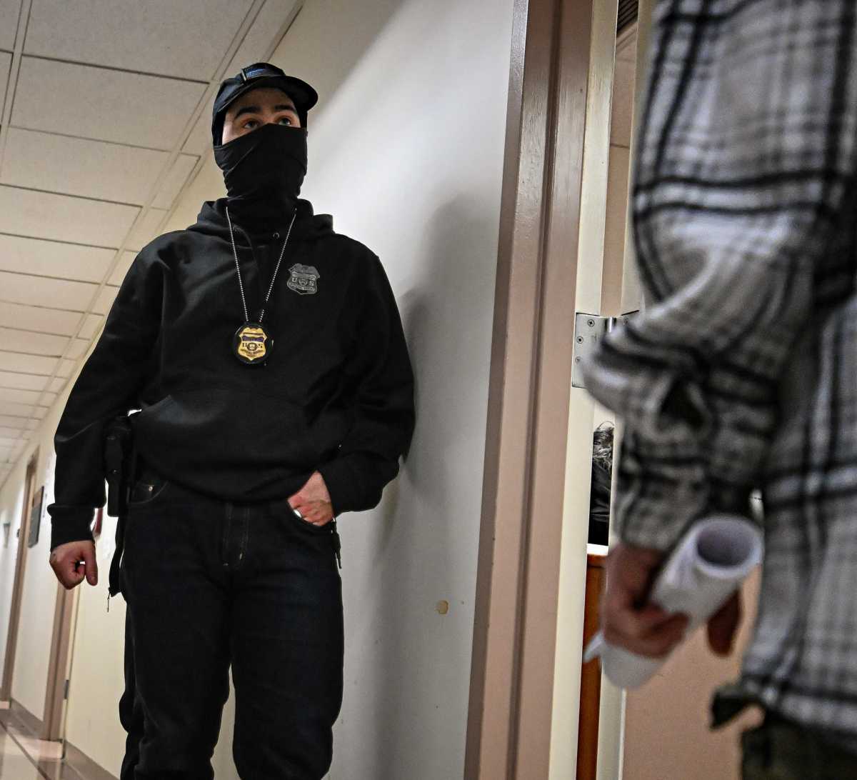 ICE agent at federal plaza