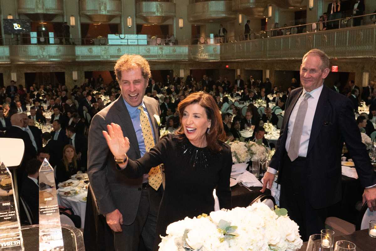 Gov. Kathy Hochul waving at REBNY gala