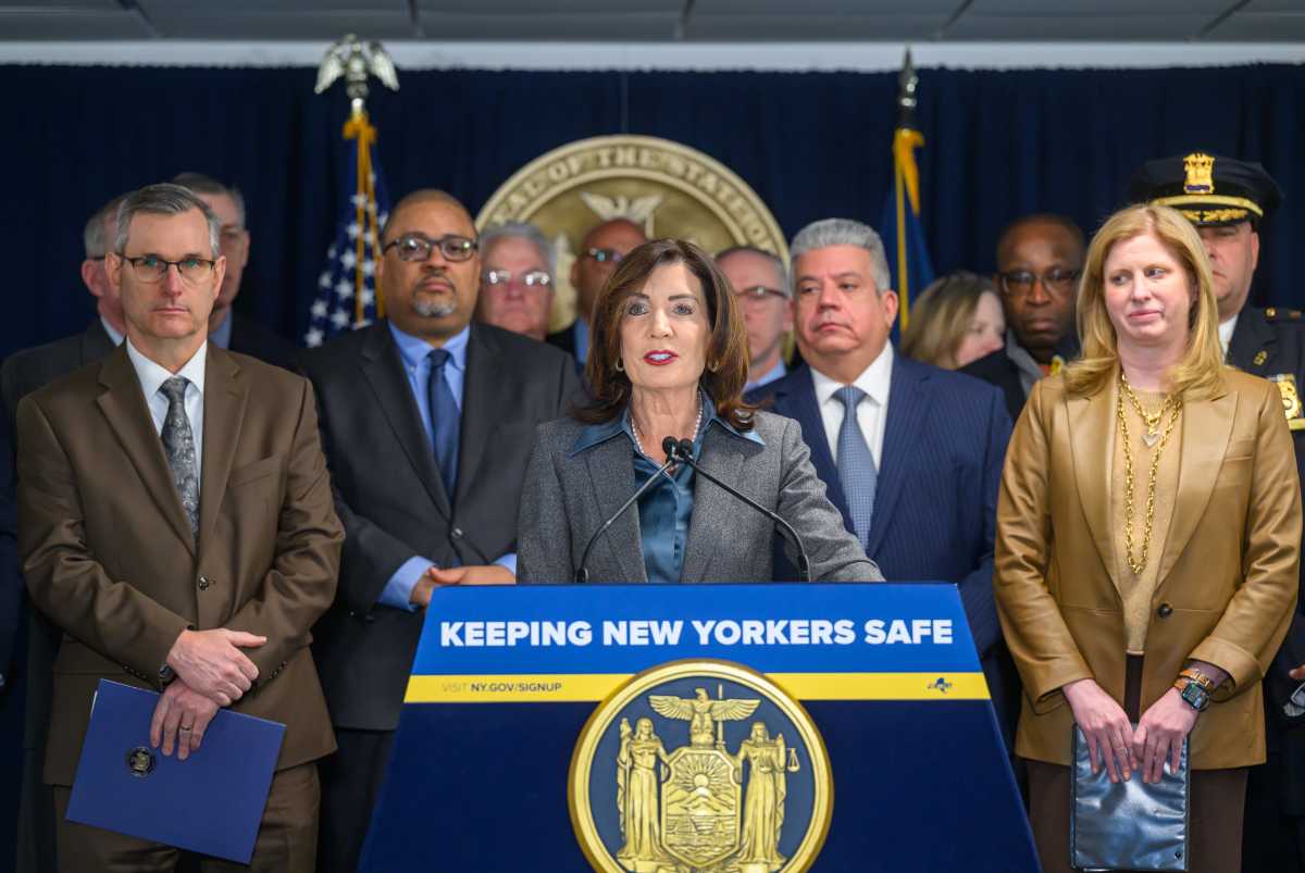 Hochul moves to ban ICE from deputizing New York police, calls it a move to stop Trump 'tyranny' 2 Hochul with elected officials announcing plan to stop ICE cooperation with NY police