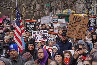 people march in Midtown against ICE and Trump