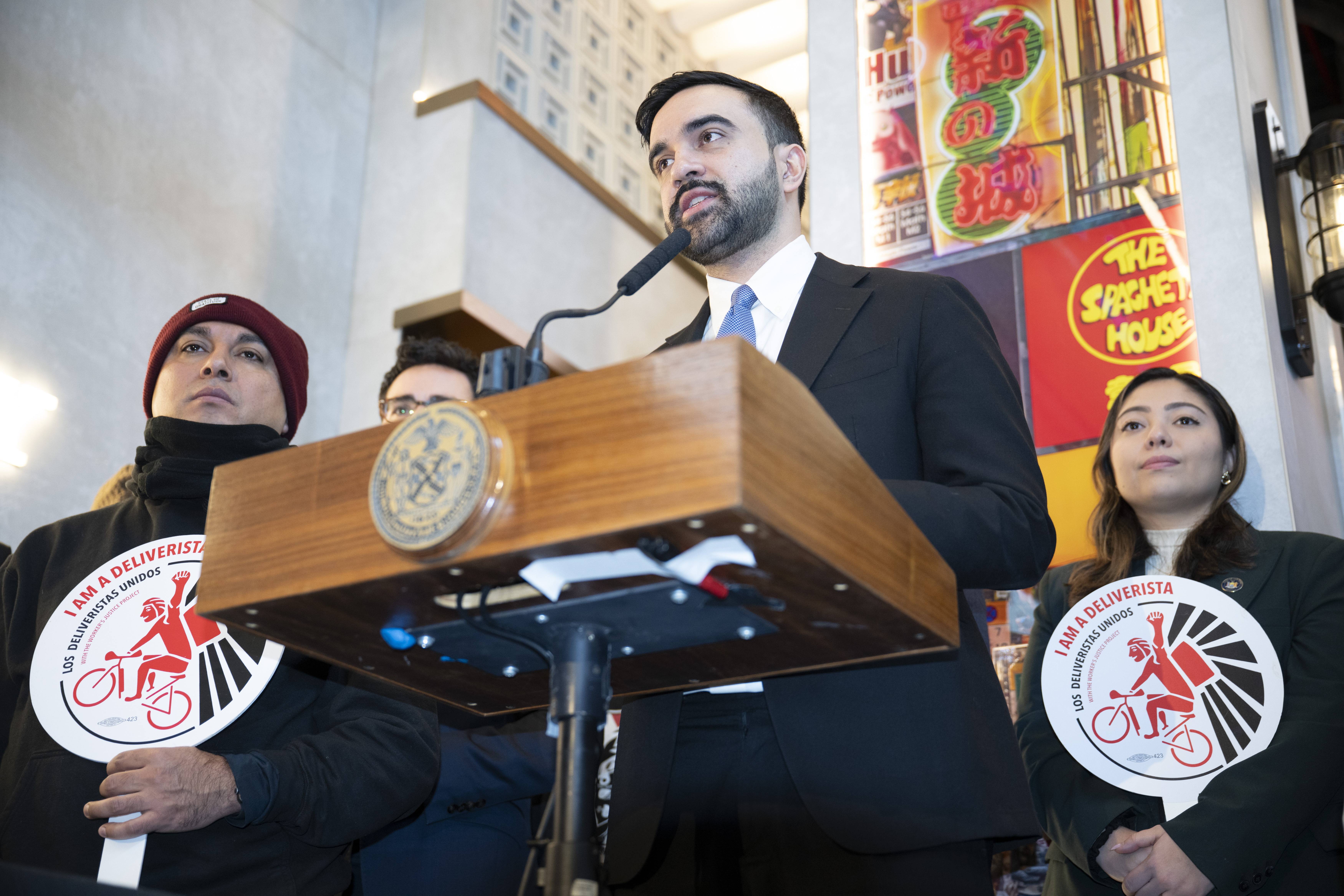 Mayor Zohran Mamdani speaking at microphone