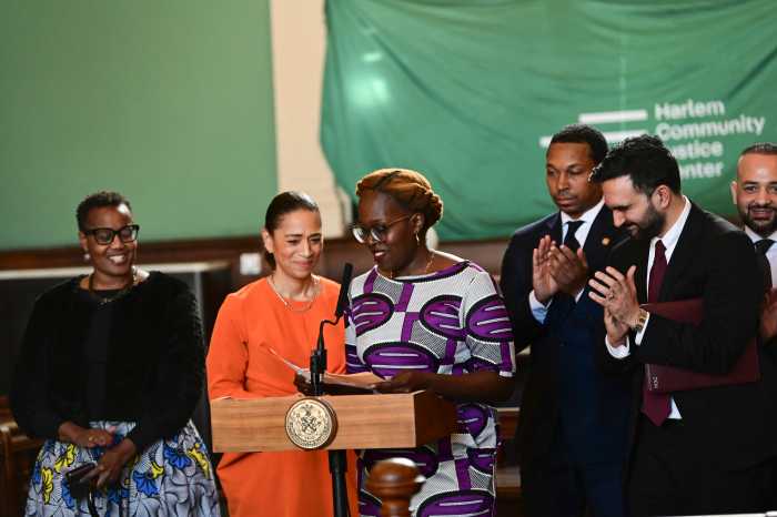 Afua Atta-Mensah, newly appointed Chief Equity Officer, speaks alongside Mayor Mamdani in Harlem on Jan. 15,