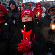 New Yorkers hold candlelight vigil at VA Hospital to honor Alex Pretti, Minneapolis nurse shot dead by ICE agents 4 Nurses hold candles for Alex Pretti at vigil
