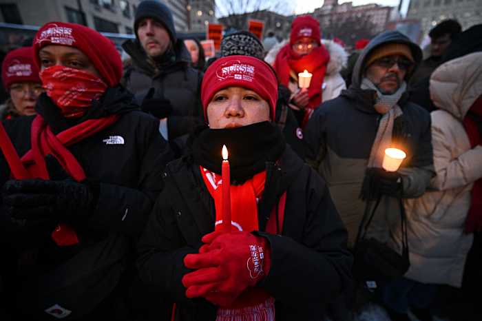 New Yorkers hold candlelight vigil at VA Hospital to honor Alex Pretti, Minneapolis nurse shot dead by ICE agents 1 Nurses hold candles for Alex Pretti at vigil
