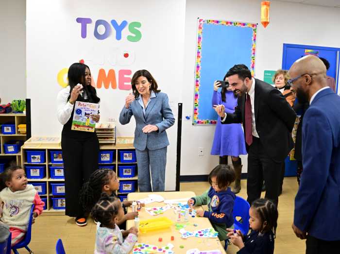MAMDANI’S FIRST 100 DAYS: '2-Care' program agreement with mayor and governor to provide universal childcare for NYC tots 6 Gov Hochul (left ) and Mayor Zohran Mamdani (Right) greet pre-schoolers at a YMCA in Flatbush, Brooklyn on Thursday, January 8.