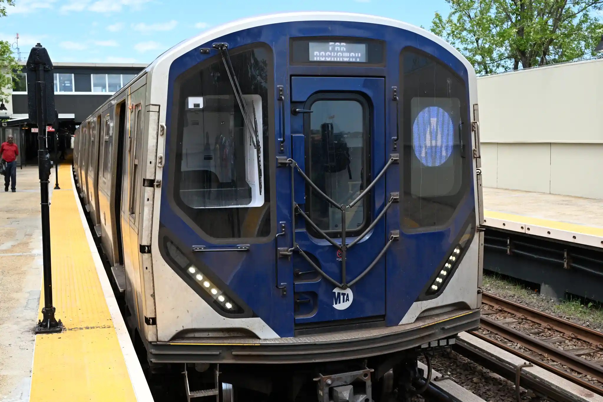 A train with subway conductor in Queens