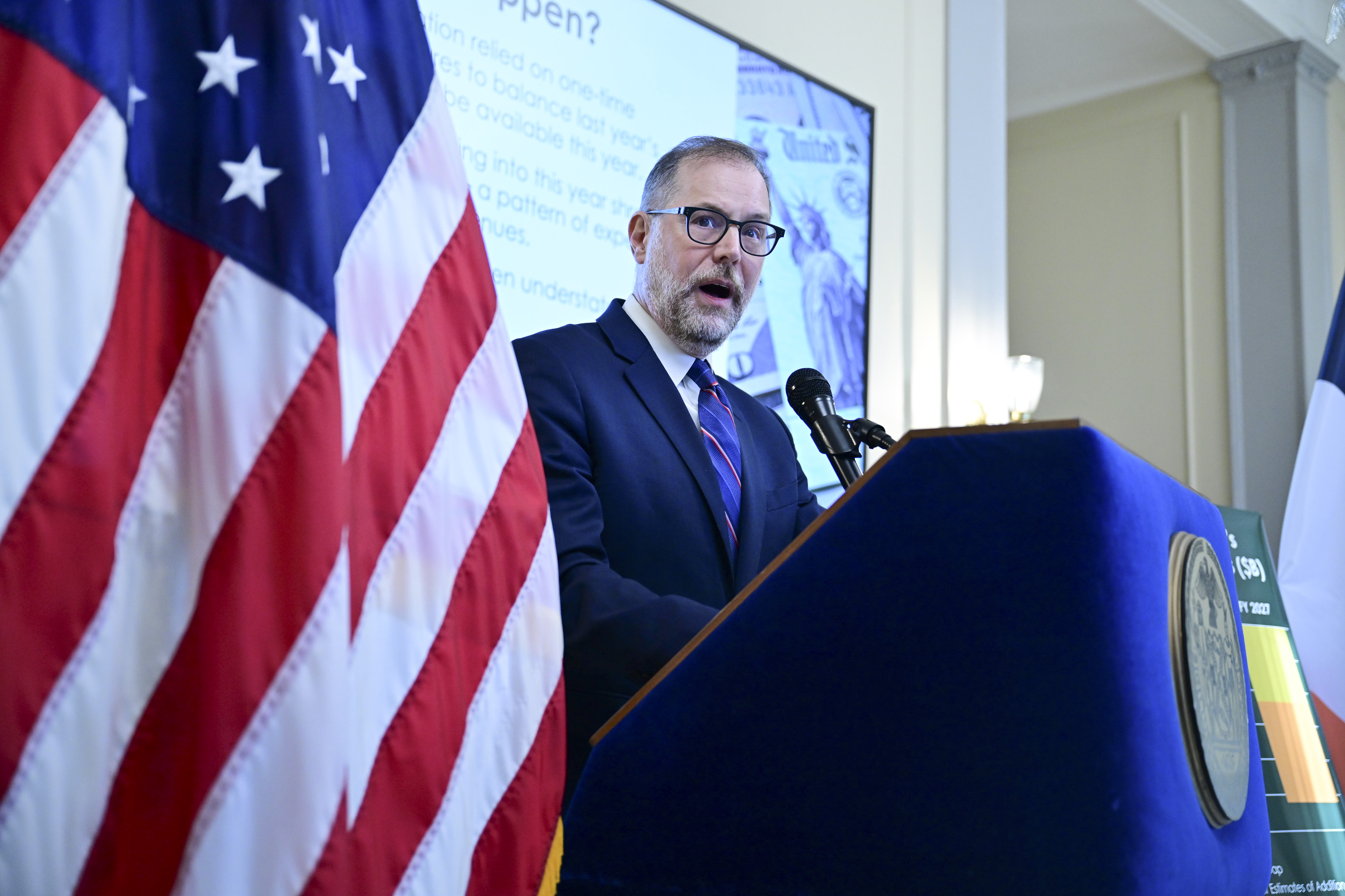 City Comptroller Mark Levine addresses reporters at a Lower Manhattan press conference Friday, outlining projected budget gaps facing New York City.