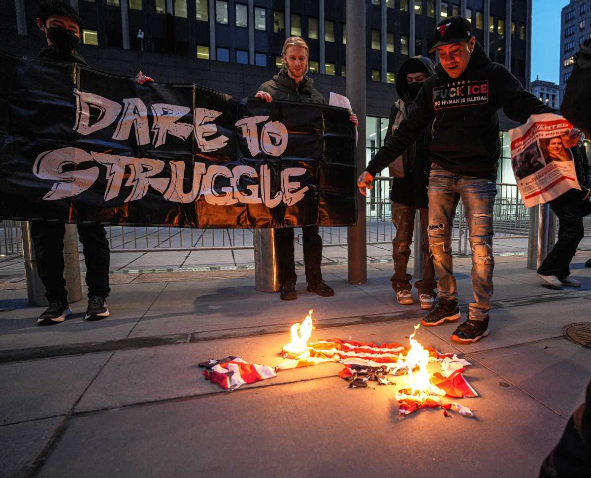 Radical anti-ICE protesters burn flags outside Manhattan immigration court, create wanted posters for agent who shot Renee Good