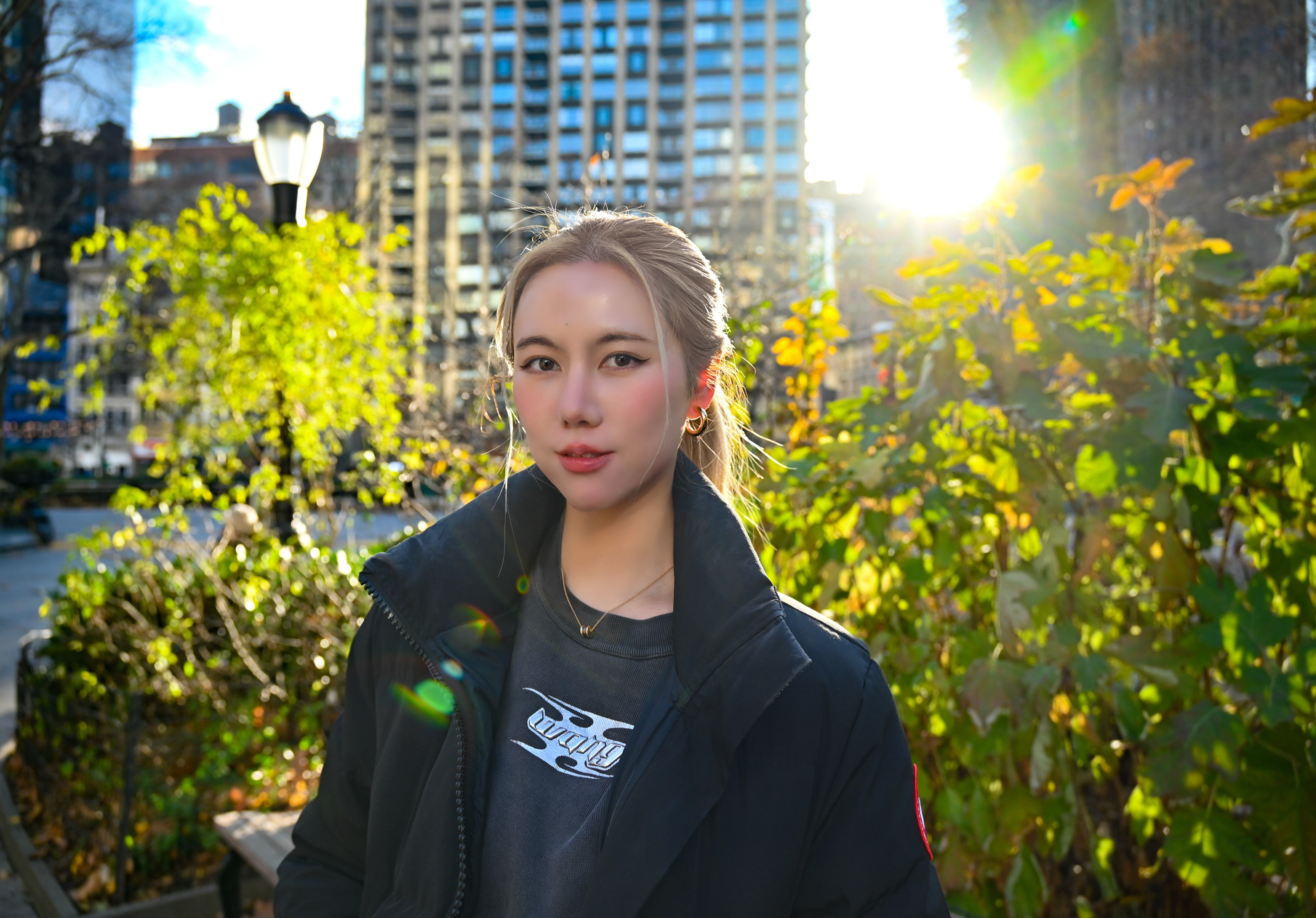 woman with blonde hair in a park