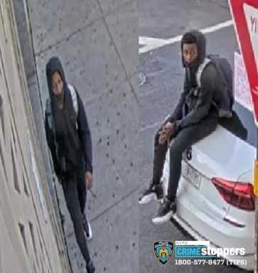 NYPD photo of two suspects wearing dark colored clothing