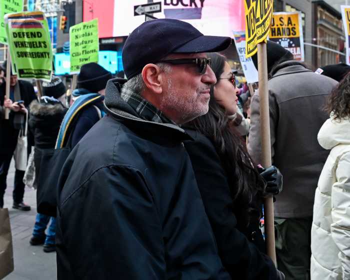 Times Square rally in wake of Trump's Venezuela strike sees hundreds decry operation as a war crime 6