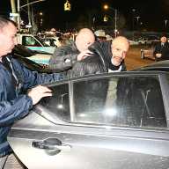 Homeless man in Bronx booked for sparking deadly high-rise fire and explosion that displaced 175 people 16 suspect in deadly bronx fire led into police car