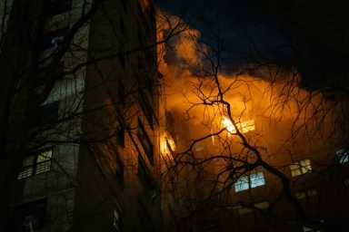 flames pour out of Bronx building after gas explosion