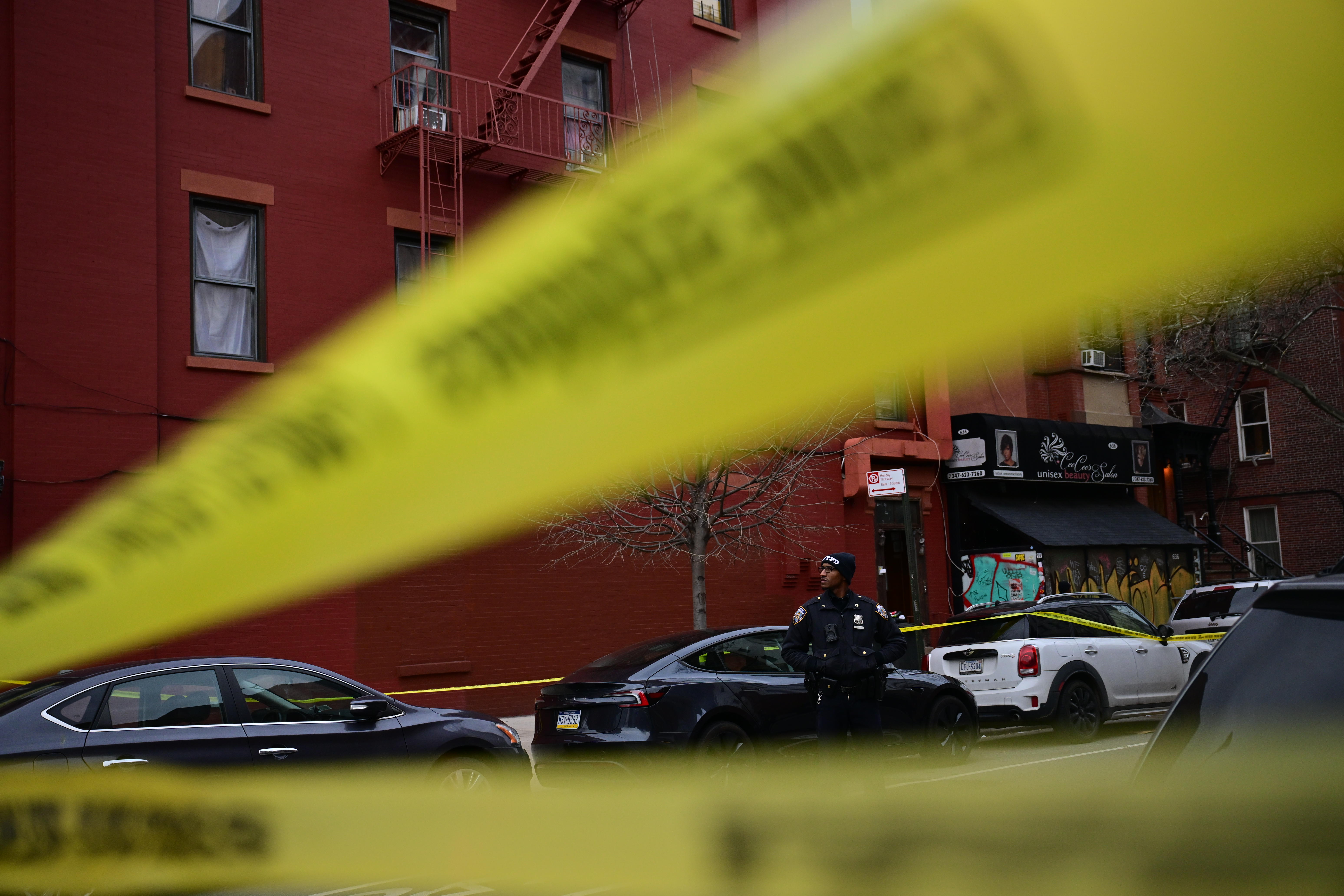 Police tape at scene where Brooklyn woman was stabbed to death