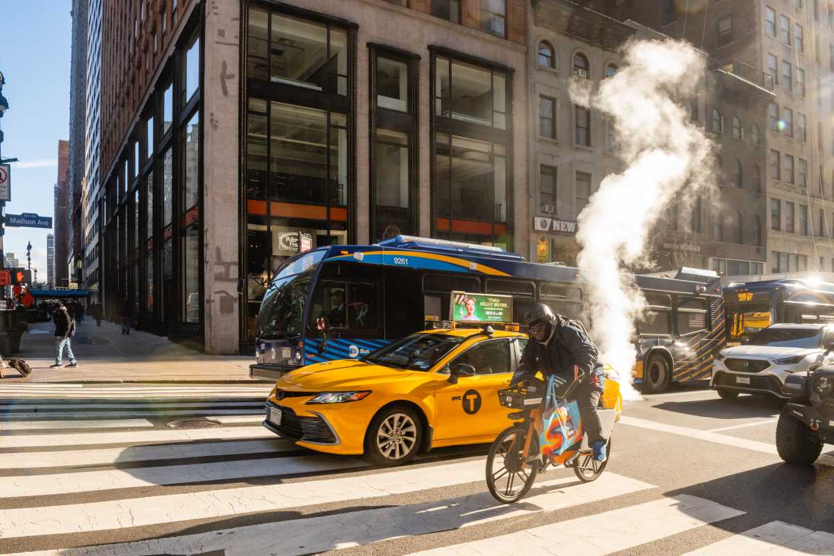 buses moving along Madison Avenue in Midtown in Mamdani era