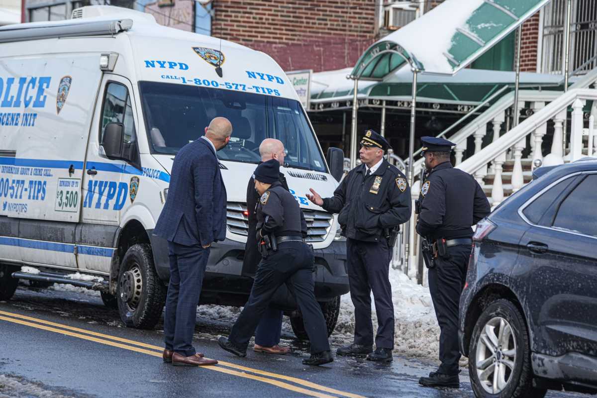 detectives outside Queens home after police-involved shooting