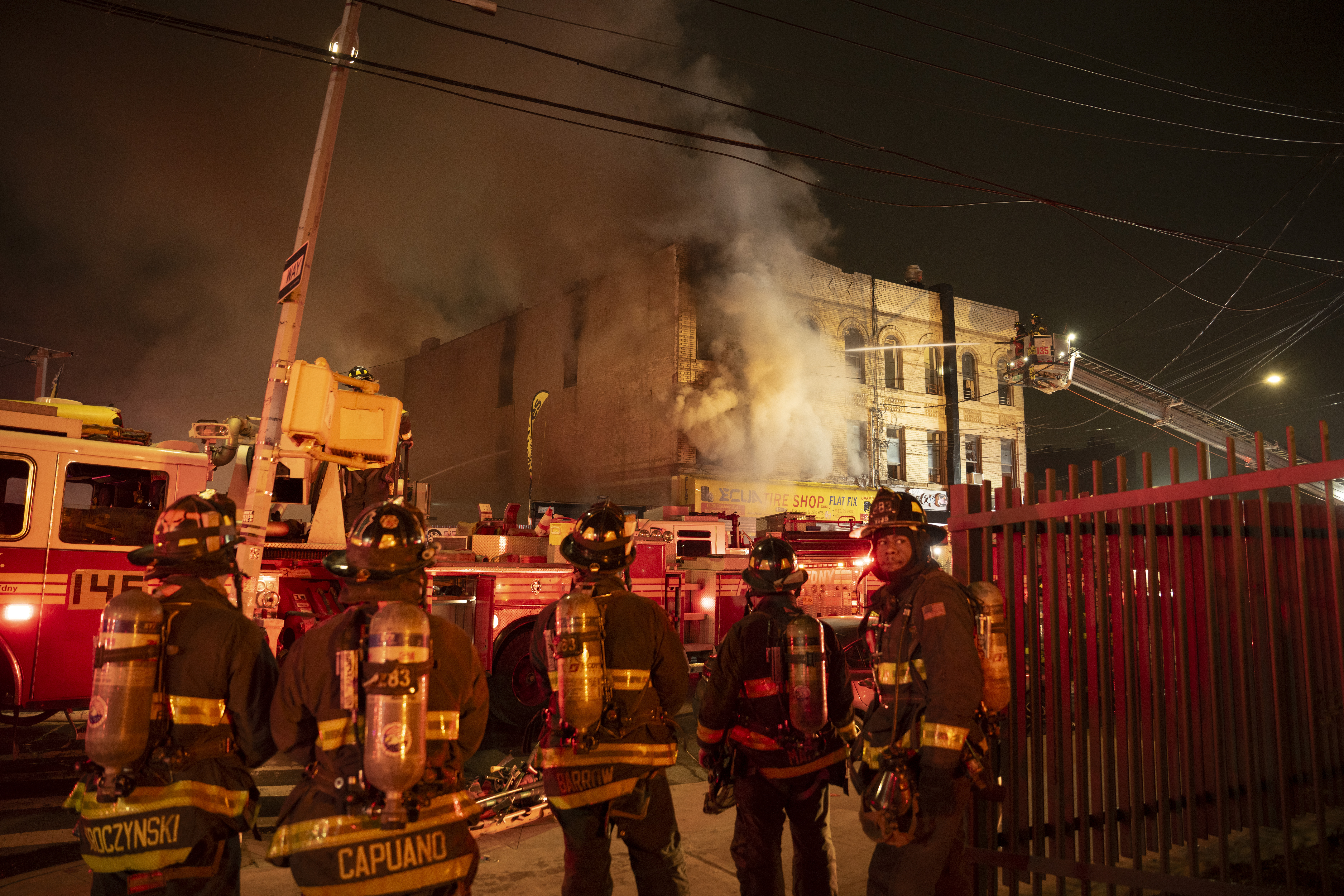 Firefighters at scene of Queens three-alarm fire
