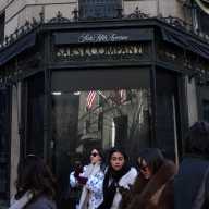 Fashion fail: Saks Global files for bankruptcy during management restructuring 6 People passing Saks Fifth Avenue store