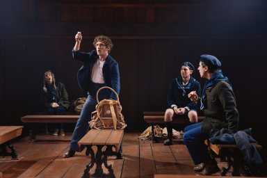 actors performing on a theater stage