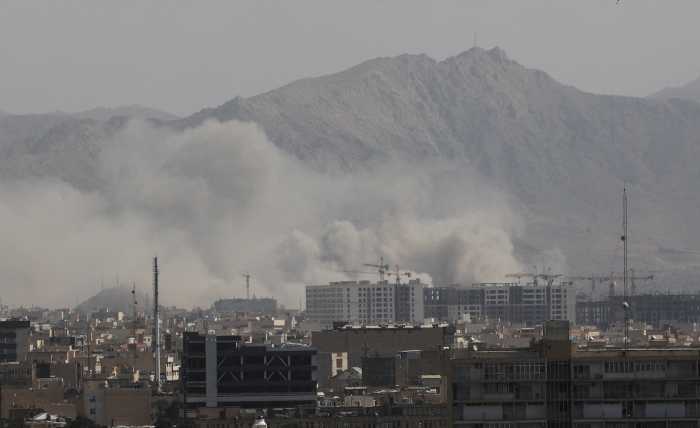 Smoke rises in Iran after military strikes