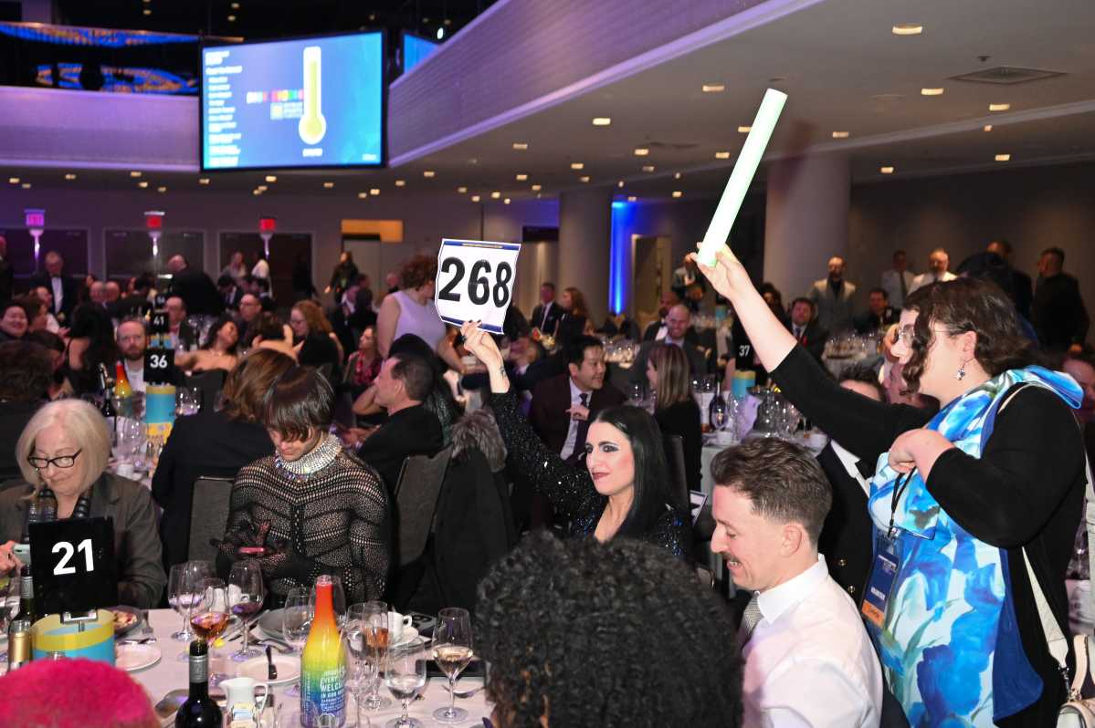 Guests bid on auction items during the Human Rights Campaign 2026 Greater New York Dinner at Marriott Marquis Times Square on February 07, 2026 in New York City.  (Photo by Bryan Bedder/Getty Images for Human Rights Campaign)