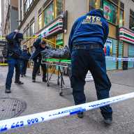 Man shot dead at Midtown 7-Eleven store during apparent argument with gunman, sources say 14 police wheel out body of man shot at Midtown 7-eleven store