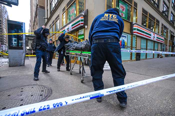 police wheel out body of man shot at Midtown 7-eleven store