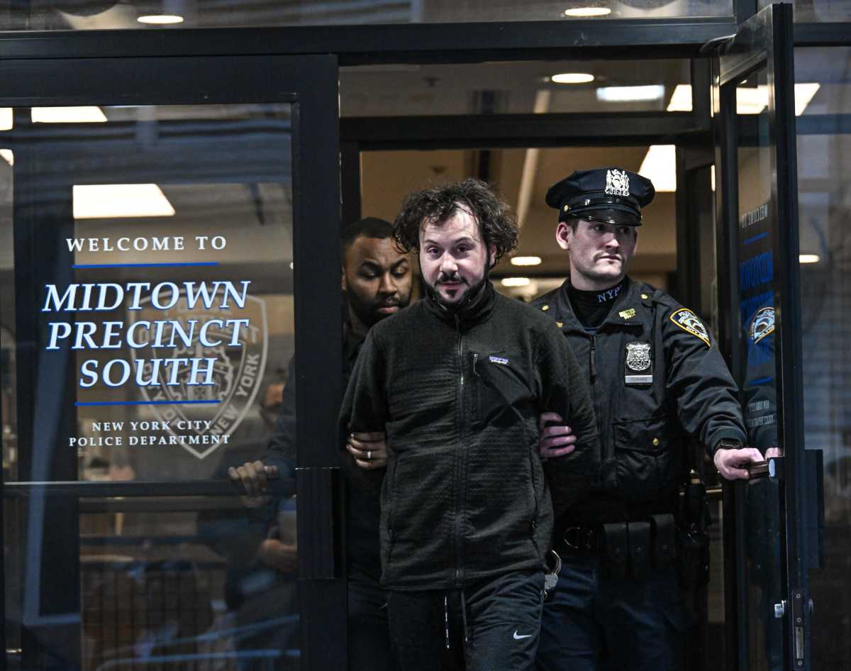 Man in MAGA hat and accomplice cuffed for hurling N-word at woman, then setting her boots on fire in Manhattan hate crime: NYPD 2 Perp walk of suspect in MAGA hat arrested for hate crime in Manhattan