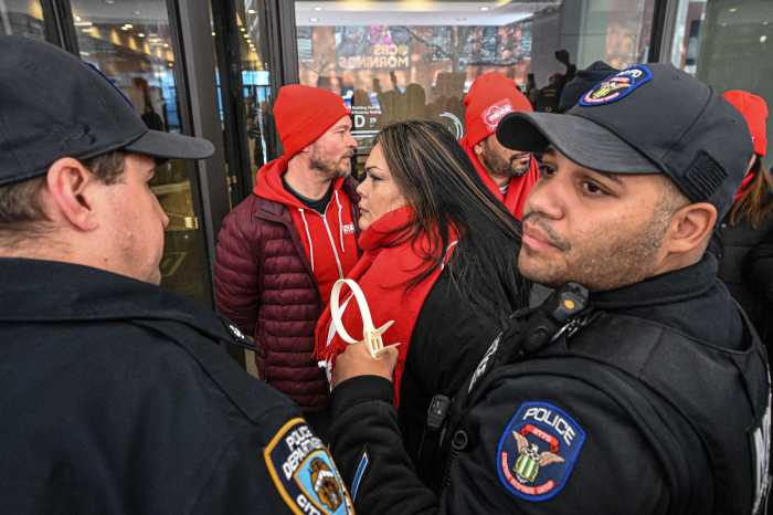 police arresting a group of people nurses
