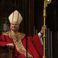 Ronald Hicks becomes New York Archbishop, pledges to take 2.8 million Catholics in a direction of change through service 6 Archbishop Ronald Hicks sitting on altar with crozier